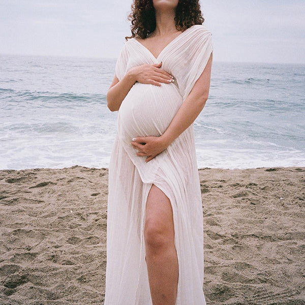 Momsmood White Irregular Side Slit Off Shoulder Deep V-neck Flowy Beach Cover Up Elegant Vacation Maternity Photoshoot Maxi Dress
