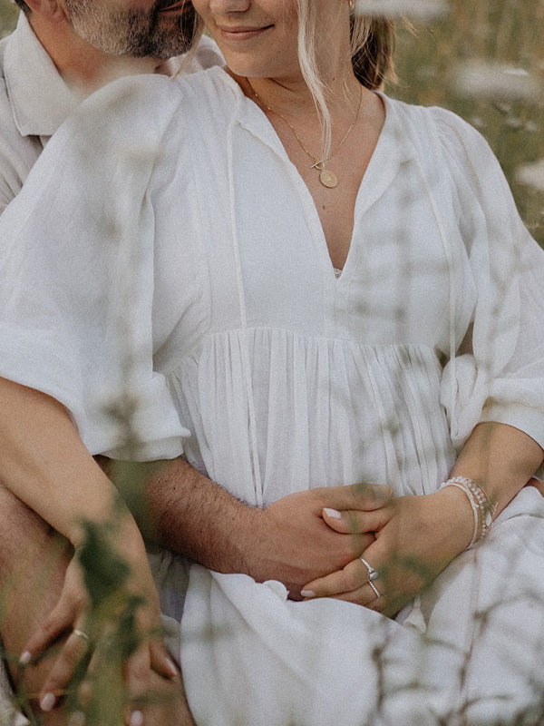 Momsmood White Front Tie Up Deep V-neck Lantern Sleeve Loose Sundress Elegant Vacation Baby Moon Flowy Boho Maternity Photoshoot Baby Shower Maxi Dress