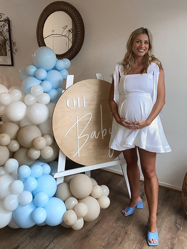 Momsmood White Tie Bow Sleeveless Smocked Backless A-line Flowy Gender Reveal Baby Shower Maternity Mini Dress